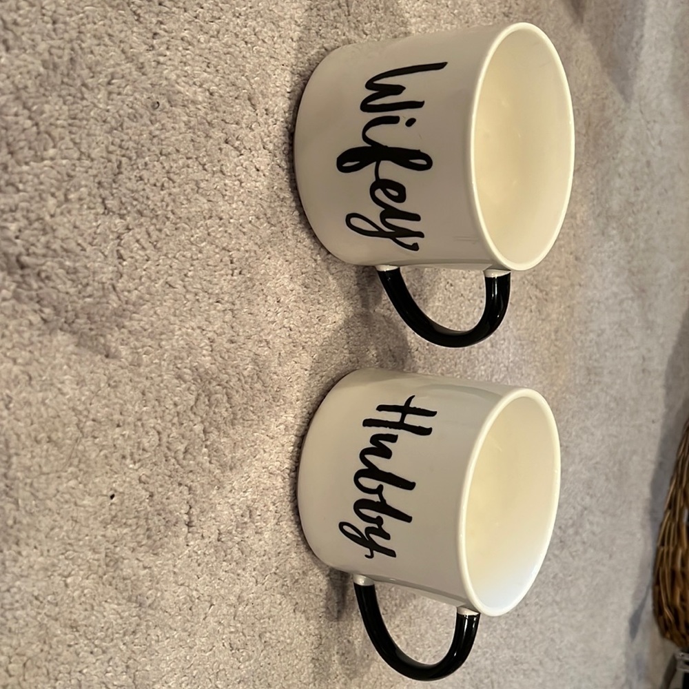 Hubby and wife mugs. Never been used for drinking only decor
